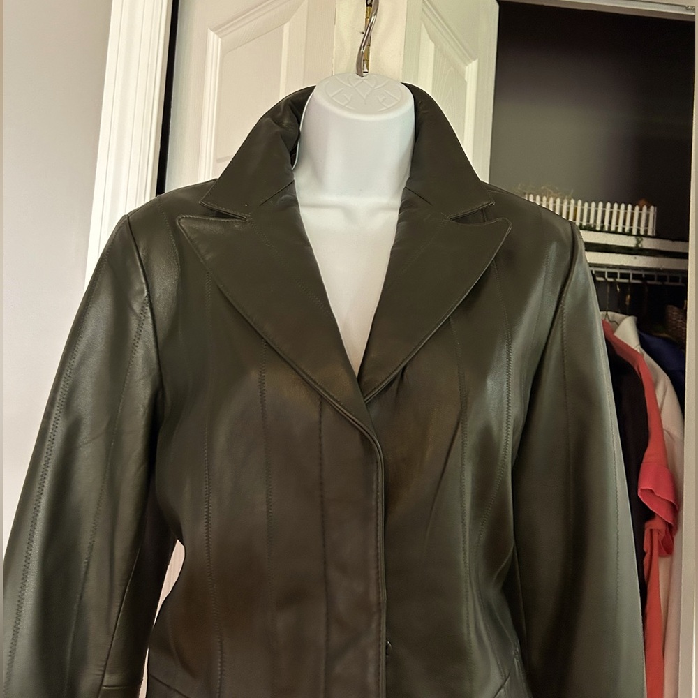 Black leather blazer sz 12. This is a very flattering blazer.
